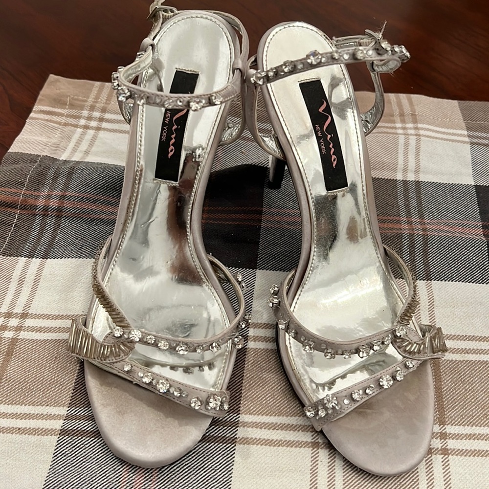 Nina New York silver 4” heels with crystal-embellished  ankle strap.